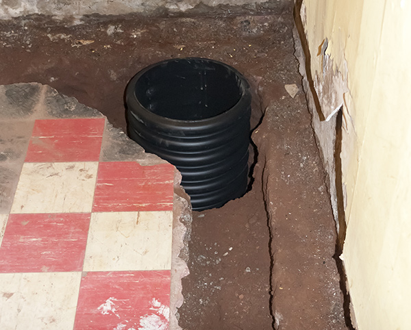Sump Pump Installation & Repair Bloomfield Hills | Plumber Restoration - french-drain-water-repair-in-basement
